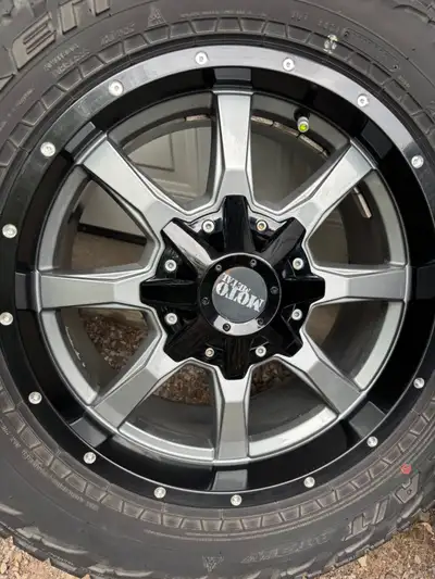 Set of 4 Moto Metal rims, caps and Falcon tires. Rims are in excellent condition, no rash or damage....