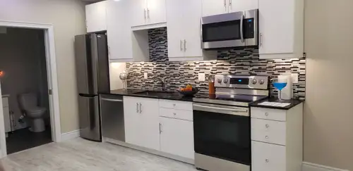 Modern, bright, and spacious 1-bedroom basement apartment available immediately in a quiet and safe...