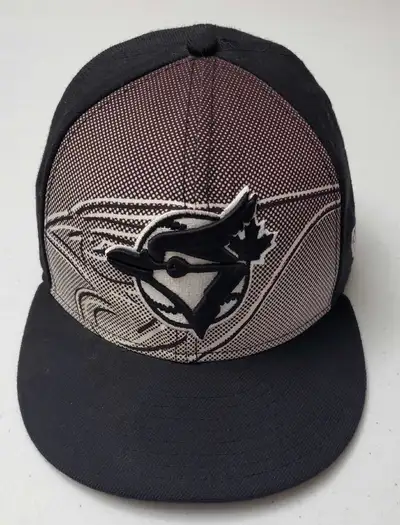 Here we have a New Era blue jays baseball fullback hat size 7 3/4. Please see pictures for exact con...
