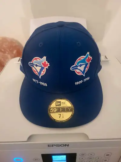 Toronto Blue Jays historical logo 59Fitty Fitted New Era Hat Features bold embroidery of the team's...