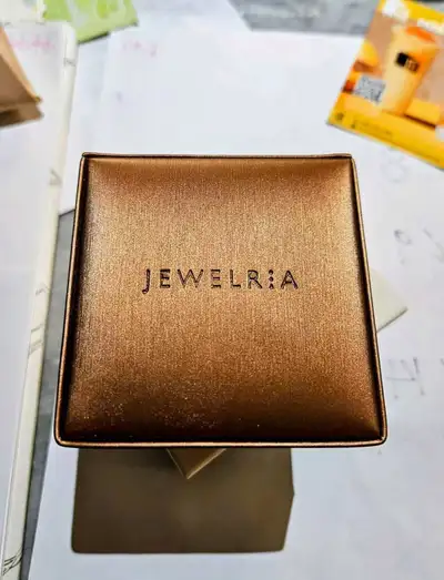 This elegant diamond bar necklace is from the renowned jewelry brand Chow Tai Fook. It features a de...
