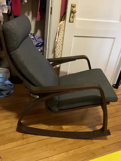 IKEA Poang rocking chair and ottoman in “black-brown” Well loved for a good 6-8 months in our nurser...