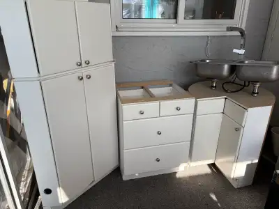 Kitchen Craft kitchen cabinets. Tall corner cabinet is 66 inches high and 25 inches wide. Drawer cab...