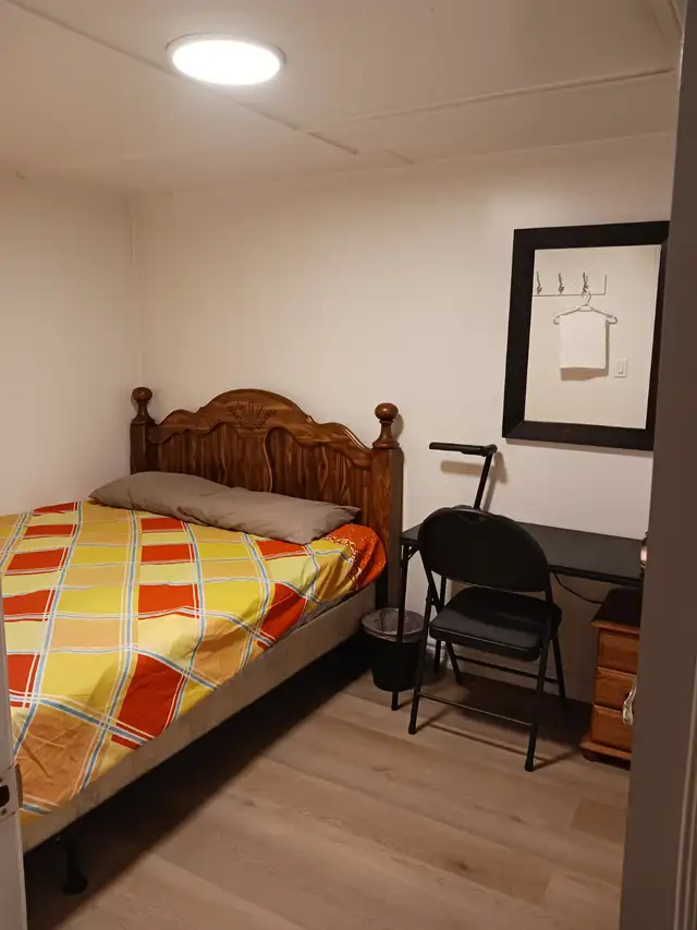 A brand new private day room with a queen-size bed