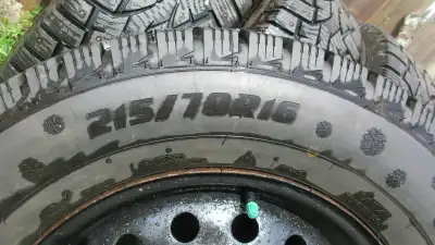 4 TIRES /RIMS,CLOSE TO 100% TREAD,ONLY WEAR ON THE STUDS