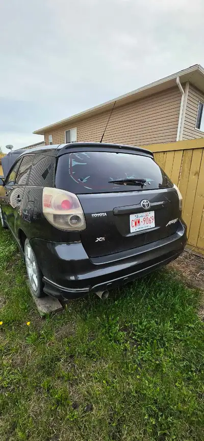 2005 Toyota Matrix, little beat up, has a seal leak on tranny drive shady, no time to see if I can f...