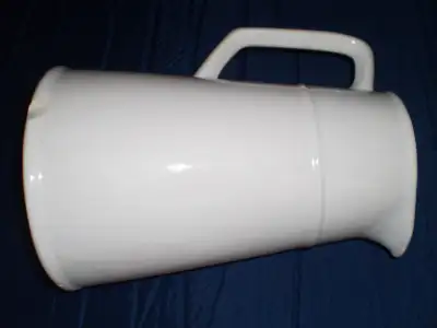 Portuguese Porcelain Water Vase, 12 inches small chip in the brim $10 pickup ONLY