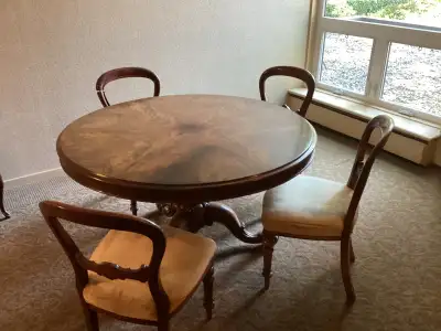 Antique dining room table and chairs, View more