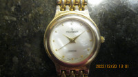 Ladies PEUGEOT mother of pearl analog quartz wrist watch