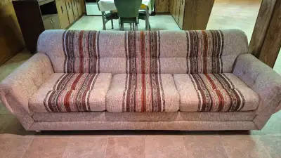$100.00 (cash only) Four piece cloth sofa set. (Sofa, 2 chairs and foot stool) Clean. In good condit...