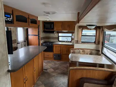 - 2011 Keystone Sprinter Camper Trailer - Bumper Tow - 24’ - Single slide out - Thermal Package (30B...