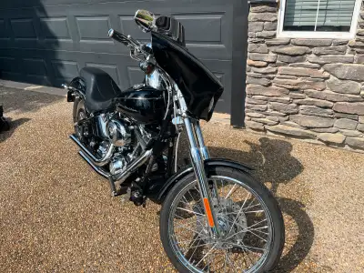 Bike is in great condition, has stage 1 kit, Rinehart exhaust, 96 cu.in. Forward controls, new tires...