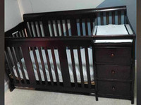 CRIB that turns Into toddler bed 