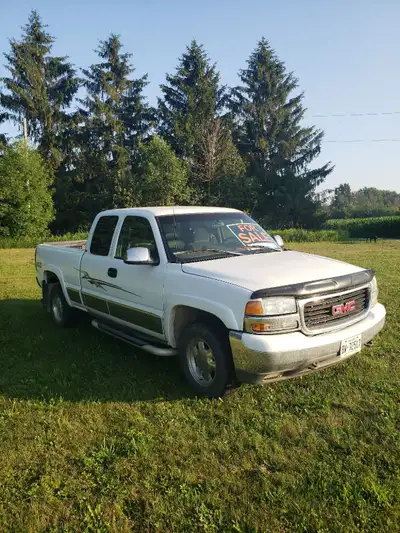 1999 GMC Sierra. 247000km. This vehicle is being sold AS IS! I drove it home from Calgary last fall....