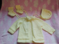 Crocheted baby outfit open to offers.