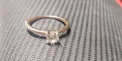I have two matching rings, they are rose gold with diamonds in the band and the main diamond on the...