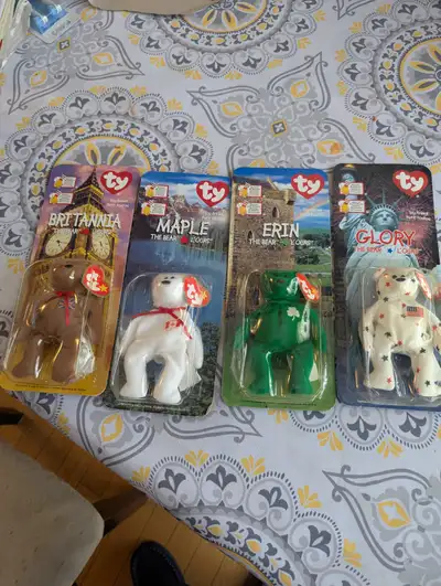 collectable bears, the set, mini beanie babies, rare and will go up in value. All are in their packa...