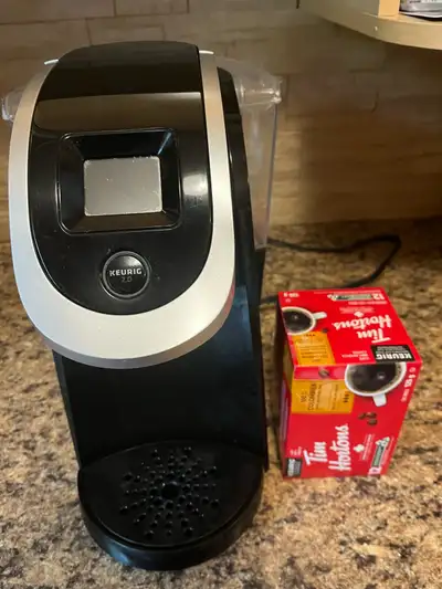 Kuerig coffee maker and 12 Timmy’s pods Both for $40