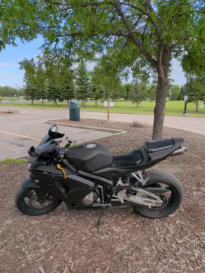 Ready to ride. Super clean and runs excellent. Tons of fun. Honda 2006 cbr 600rr with rhino lining a...
