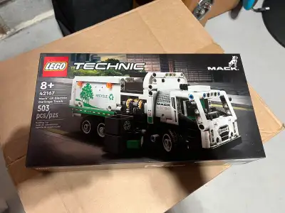 I'm selling a brand new, unopened LEGO Technic Mack LR Electric Garbage Truck set (42167) featuring...
