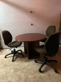 Heavy duty office table and 3 office chairs.
