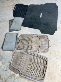 Winter tires and floor mats for a Malibu