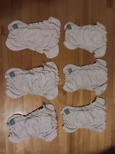 6 good condition Motherease Sandy's diapers, size small. No stains and elastics in good condition. P...