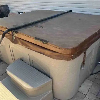 Hot tub for free if you can come pick it up. - Has some sort of heating issue, could be with wiring.
