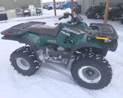 2001 Polaris Explorer 400 4x4. Two stroke engine. Less than 300 hours since new! No that is not a mi...