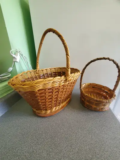 2 Wickers Baskets Good condition Very versatile - many uses A wonderful addition to any collection....