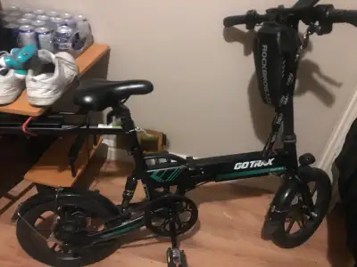 Go trax folding Pedal assist bike falls easy to put in a car everything works flawlessly has two key...