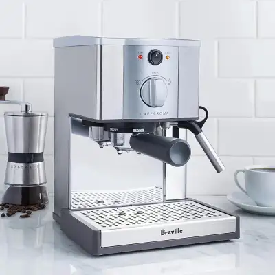 Stainless-steel espresso machine with 15-bar thermoblock pump Dual-wall filter system for excellent...