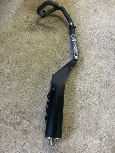 Stock exhaust off a 2022 Suzuki DRZ 400 S. Exhaust has 1200 km on it. It is still in new condition....