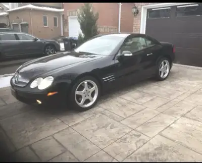 Check out this sleek, used 2003 Mercedes-Benz SL 500, a luxury roadster with a powerful engine and e...
