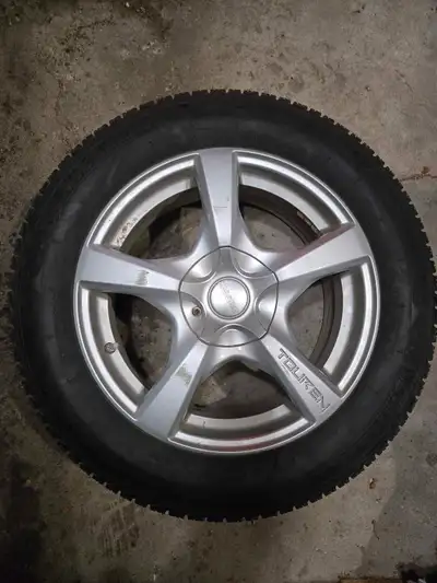 Michelin X-ICE winter tires on rims. 215/60 R17 In great condition. Lots of tread left.