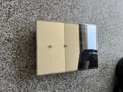 17.5 inches by 13.5 inches approx. Glass shelves included.