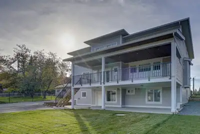 Modern 2 bedroom above ground basement suite . Granite counters . In suite laundry . Patio area for...