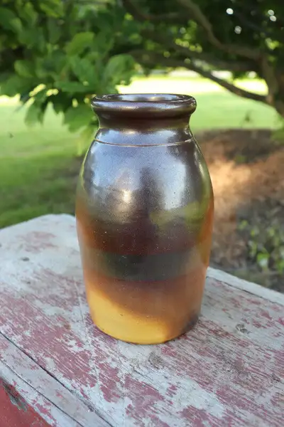 Hi. I have a vintage stoneware crock with odd glaze for sale. The crock shows some wear and marks. T...