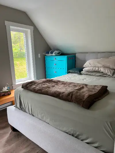 One bedroom in a two story house