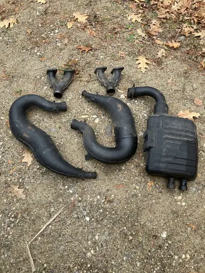 Stock pipes. muffler and y connectors. Very good condition. Likely take offs when new.