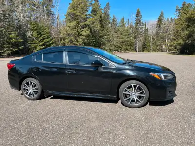 AWD, safety checked, sunroof, A/C, heated cloth seats, back up camera, bluetooth, car starter, premi...