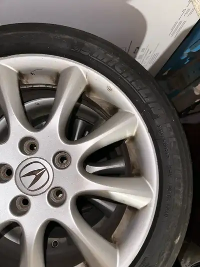 Selling Acura tsx rims 17inch with Michelin all season tires both are in very good condition with go...