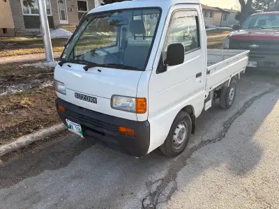 Safetied 1997 Suzuki Carry Kei truck. Just under 51000 kms. Right hand drive, Rear wheel drive, 3 cy...