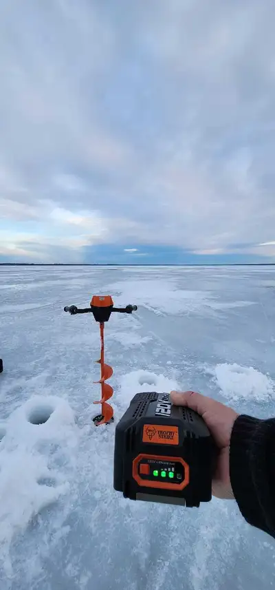 Ice fishing Auger Trophy Strike with battery charger and bag , View more