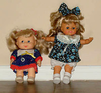 2 dolls in Excellent Condition : As Shown : SmokeFree,Clean