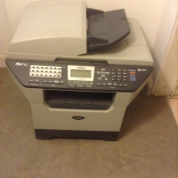 Brother MFC 8460N Printer with new additional cartridge.