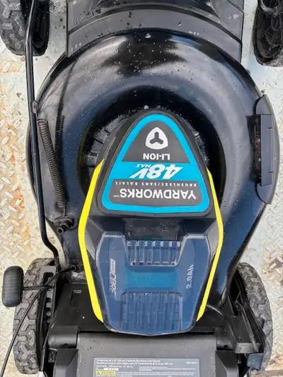 Yardworks battery run lawnmower. 22 Inch cut, brushless and self propelled. Comes with bag and charg...
