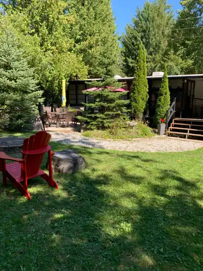 Seasonal Trailer on large, private lot (Cardinal 41) at Pigeon Lake Trailer Park Includes: 2 bedroom...