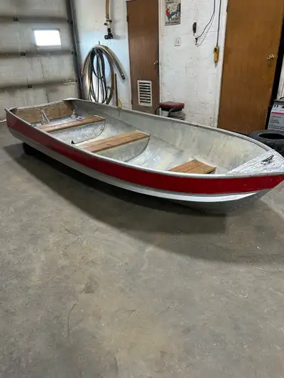 12 foot aluminum fishing boat with all the wood replaced on seats and transom corner and front gusse...