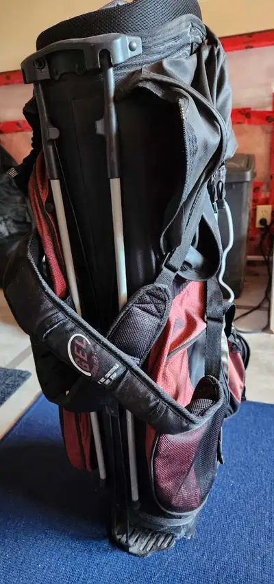 Adams golf bag $20 firm. Has gel carrying harness, rain protector and foot stand. Pockets etc in goo...